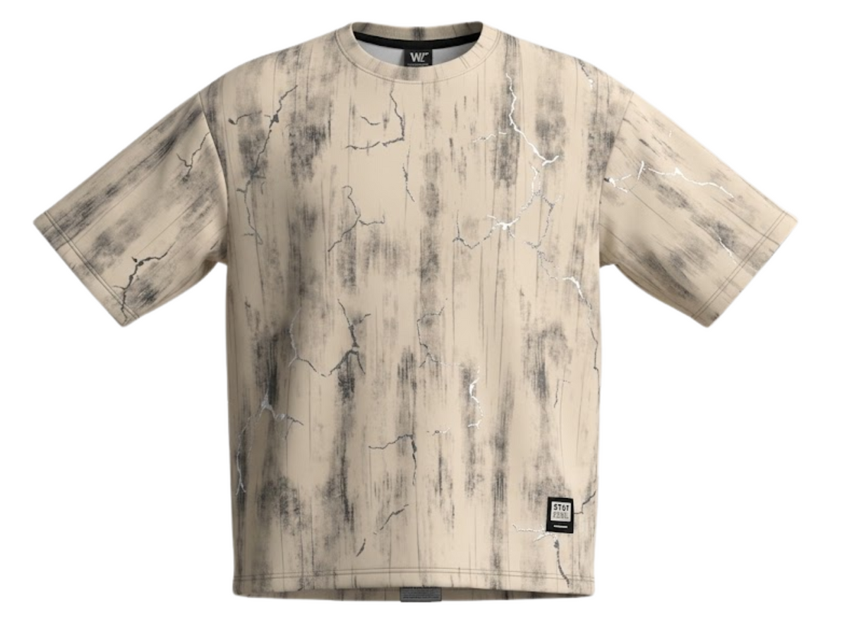 A short-sleeve crewneck t-shirt featuring an all-over abstract wood-grain print in beige and gray with white lightning-bolt details, shown flat on a white background.